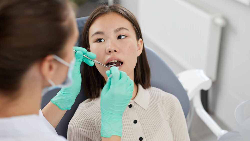 Tái khám định kỳ sau khi nhổ răng khôn